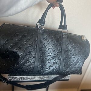 GLAMAHOLIC MONOGRAM MATTE BLACK DUFFLE BAG